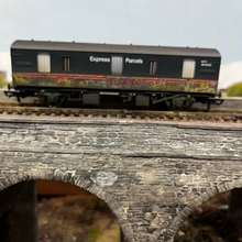 Load image into Gallery viewer, Hornby R6919 BR 4-WHEEL CCT Van - Express Parcels - (With Graffiti) - OO Gauge