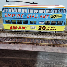 Load image into Gallery viewer, Corgi Motorised Balloon Tram in Empire Livery - OO Gauge
